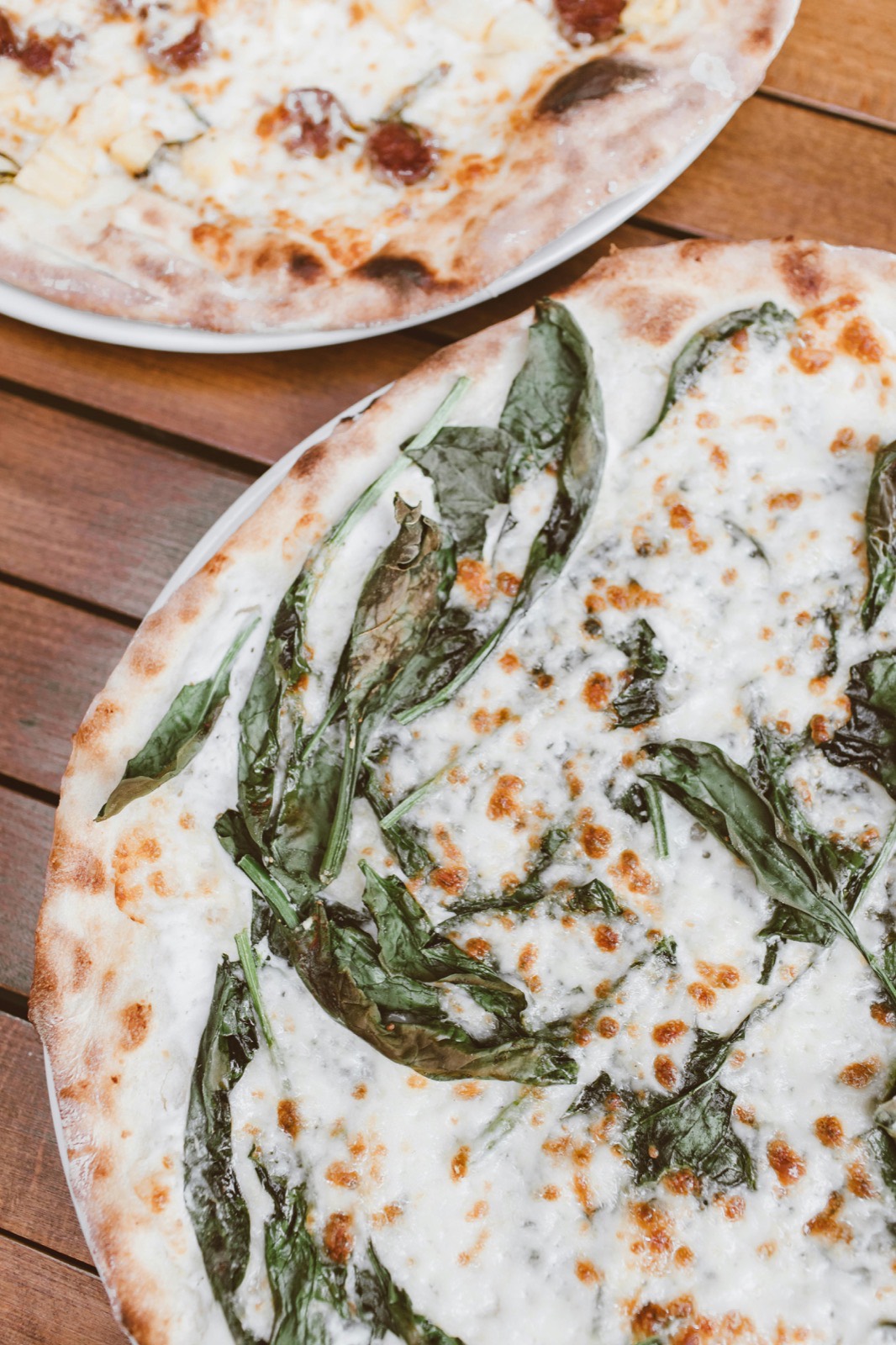 Truffle mushroom AI pizza on a dark slate surface